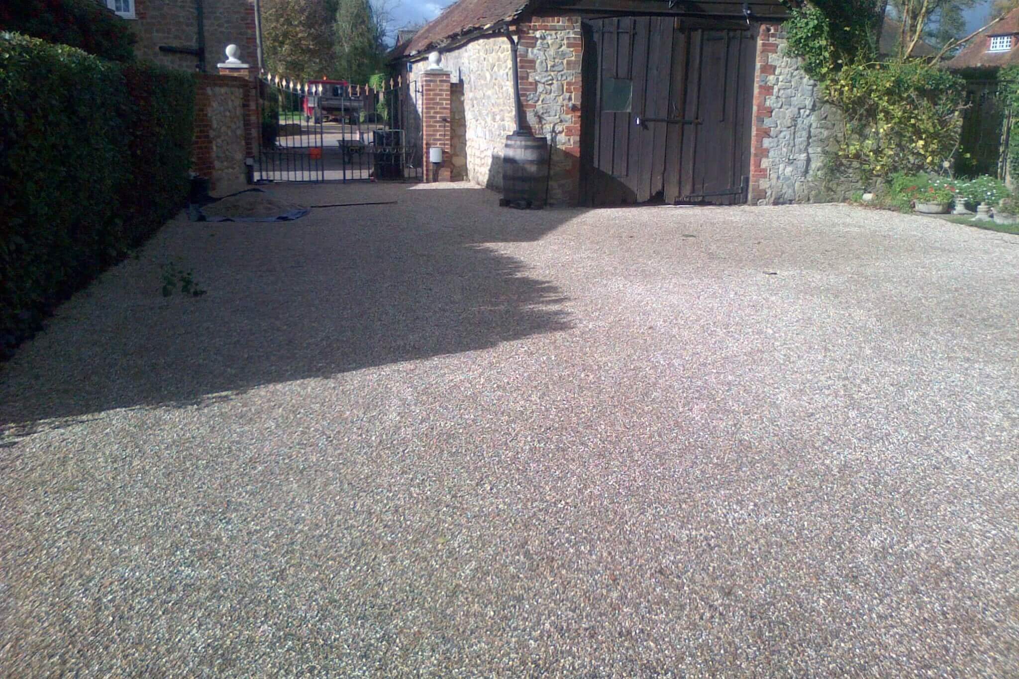 Tar and chip driveway entrance finish with neat edges