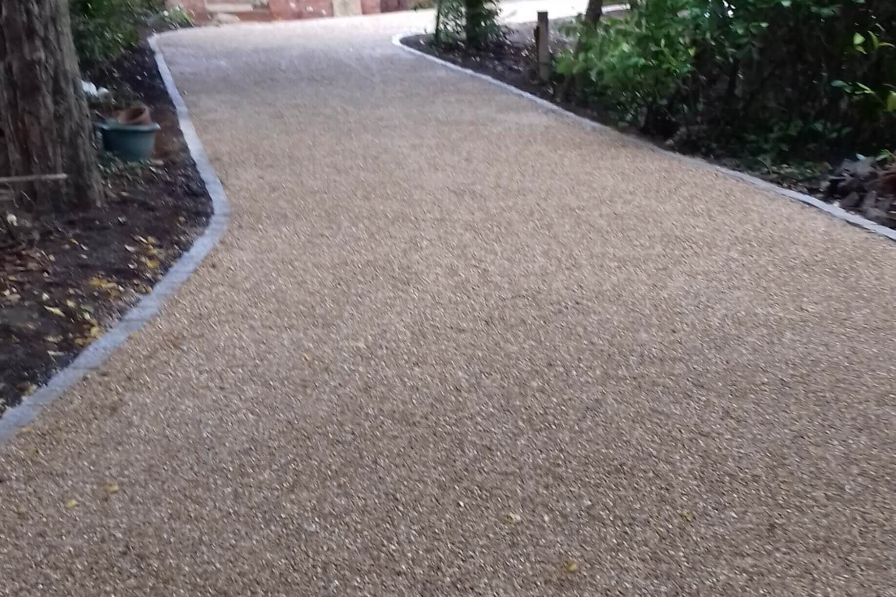 Roller compaction during tar and chip surface dressing